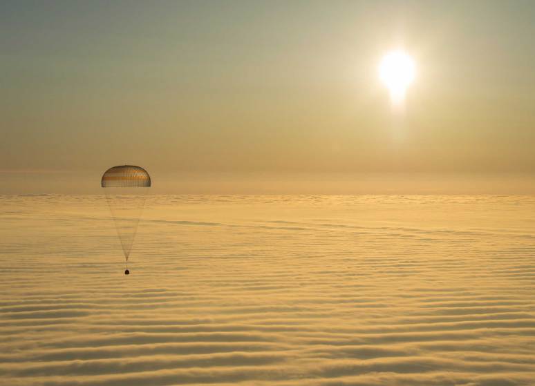 TOPSHOTS The Soyuz TMA-14M spacecraft is seen as it lands with Expedition 42 commander Barry Wilmore of NASA, Alexander Samokutyaev of the Russian Federal Space Agency (Roscosmos) and Elena Serova of Roscosmos near the town of Zhezkazgan, Kazakhstan on Thursday, March 12, 2015. NASA Astronaut Wilmore, Russian Cosmonauts Samokutyaev and Serova are returning after almost six months onboard the International Space Station where they served as members of the Expedition 41 and 42 crews. AFP PHOTO / NASA / BILL INGALLS==RESTRICTED TO EDITORIAL USE / MANDATORY CREDIT: "AFP PHOTO / NASA / BILL INGALLS"/ NO A LA CARTE SALES / NO MARKETING / NO ADVERTISING CAMPAIGNS / DISTRIBUTED AS A SERVICE TO CLIENTS==BILL INGALLS/AFP/Getty Images
