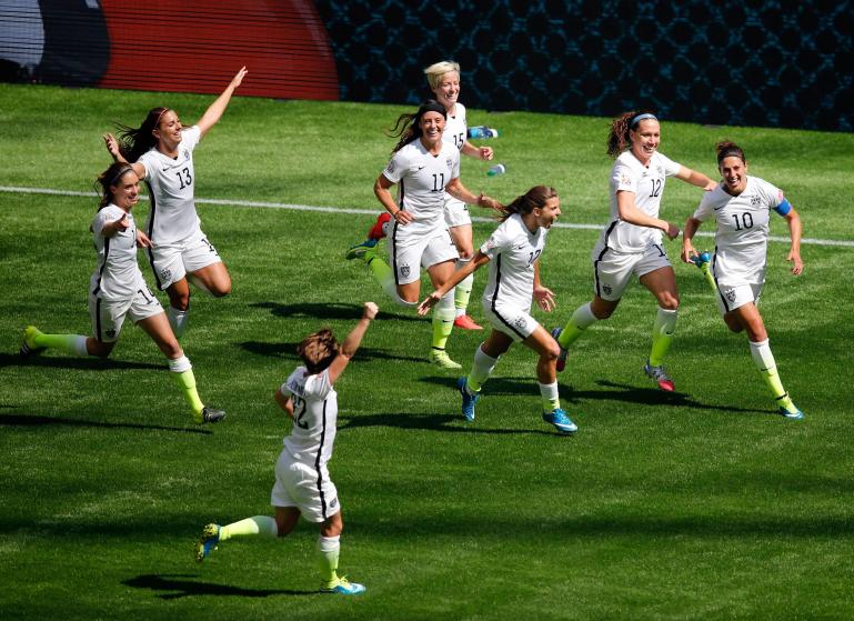 Jul 5, 2015; Vancouver, British Columbia, CAN; United States midfielder Carli Lloyd (10) celebrates with teammates after scoring against Japan during the first half of the final of the FIFA 2015 Women's World Cup at BC Place Stadium. Mandatory Credit: Erich Schlegel-USA TODAY Sports