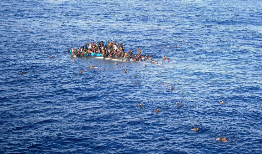 epaselect epa04712791 A†handout picture made available by German shipping company Opielok Offshore Carriers (OOC) on 20 April 2015 shows a boat with refugees close to the cargo ship 'OOC†Jaguar' in the Mediterranean sea on 12 April 2015. The ships of the German shipping company Opielok Offshore Carriers have rescued more than 1,500 people in the Mediterranean sea since December 2014. EPA/Opielok Offshore Carriers Mandatory Credit: Opielok Offshore Carriers HANDOUT EDITORIAL USE ONLY