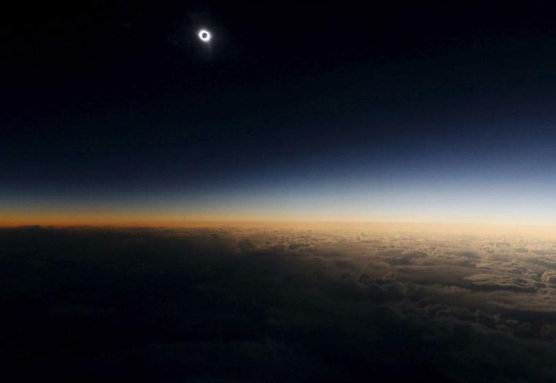 A view from a plane during the so-called "Eclipse Flight" from the Russian city of Murmansk to observe the solar eclipse above the neutral waters of the Norwegian Sea, March 20, 2015. REUTERS/Sergei Karpukhin