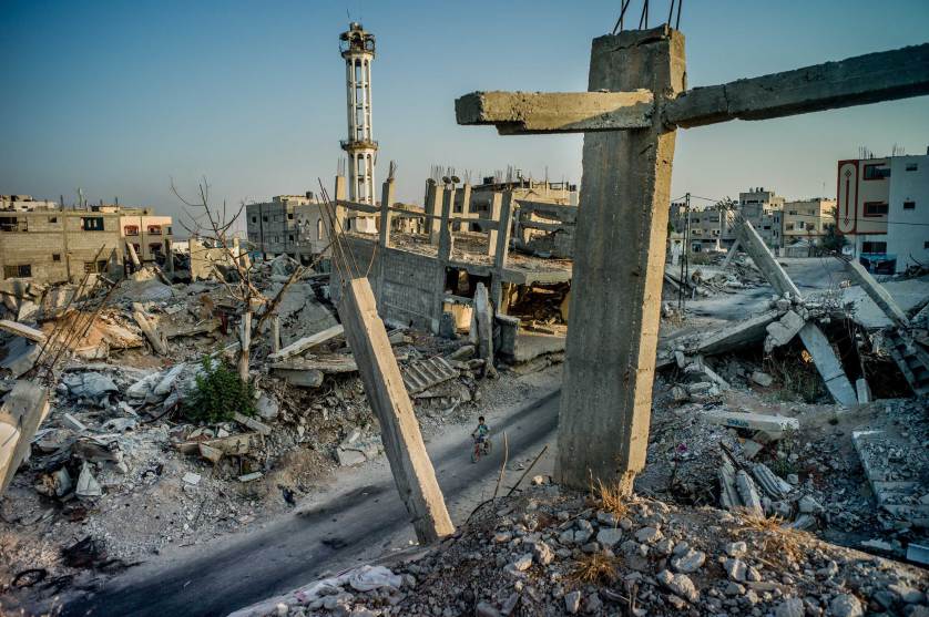 Shejaiya, the destroyed neighborhood abutting the border fence with Israel, in Gaza City, Gaza Strip, Aug. 1, 2015. A year after hostilities ended between Israel and Palestinian militants, not a single one of the nearly 18,000 homes destroyed or severely damaged in the fighting has been rebuilt, despite some $2.5 billion pledged for reconstruction. (Tomas Munita/The New York Times)